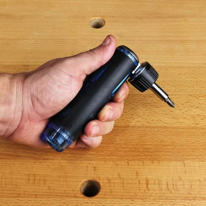 Right angle screwdriver with ergonomic handle in hand on a wooden workbench