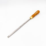 Carbide-tipped square woodworking chisel with wooden handle on white background