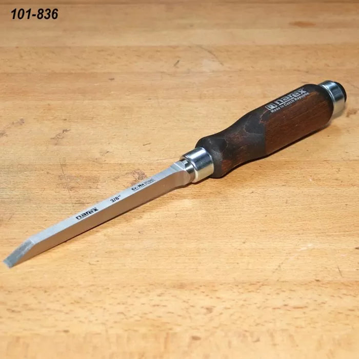 Woodworking chisel with dark wooden handle and steel blade on a workbench