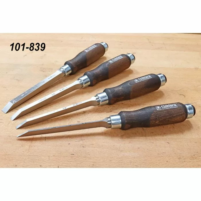 Set of four Narex wood chisels with dark wooden handles on a workbench