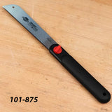 Japanese pull saw with black handle and red knob on wooden surface, woodworking hand tool