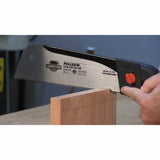 Pull saw making precise cuts in wood, woodworking hand tool, close-up action shot