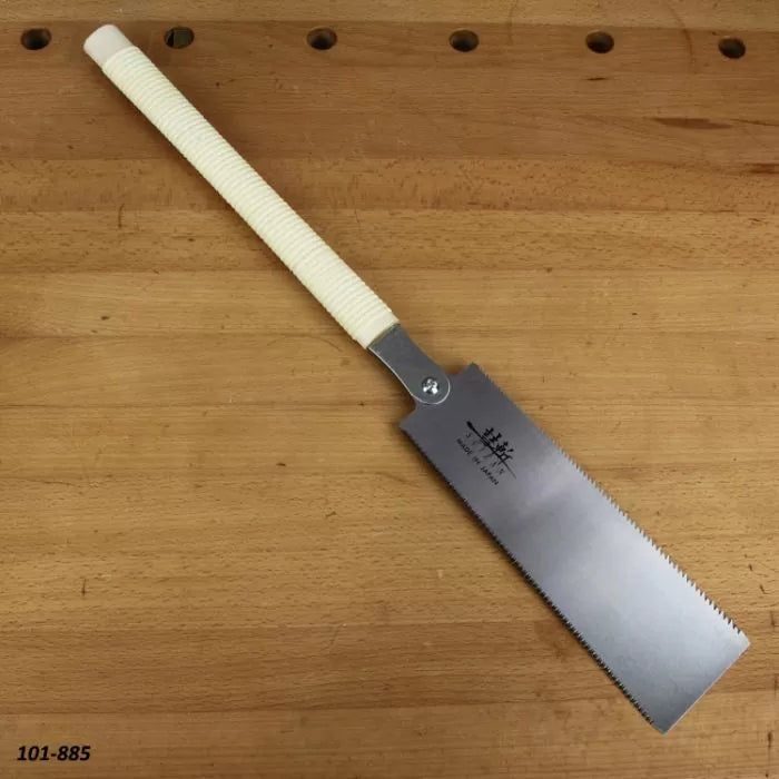 Japanese pull saw with white wrapped handle on a wooden workbench