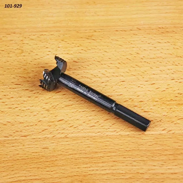 Forstner drill bit for woodworking on a wooden surface, precision cutting tool