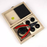 Router collet reducer set with red-handled pliers in a wooden box, woodworking tool kit