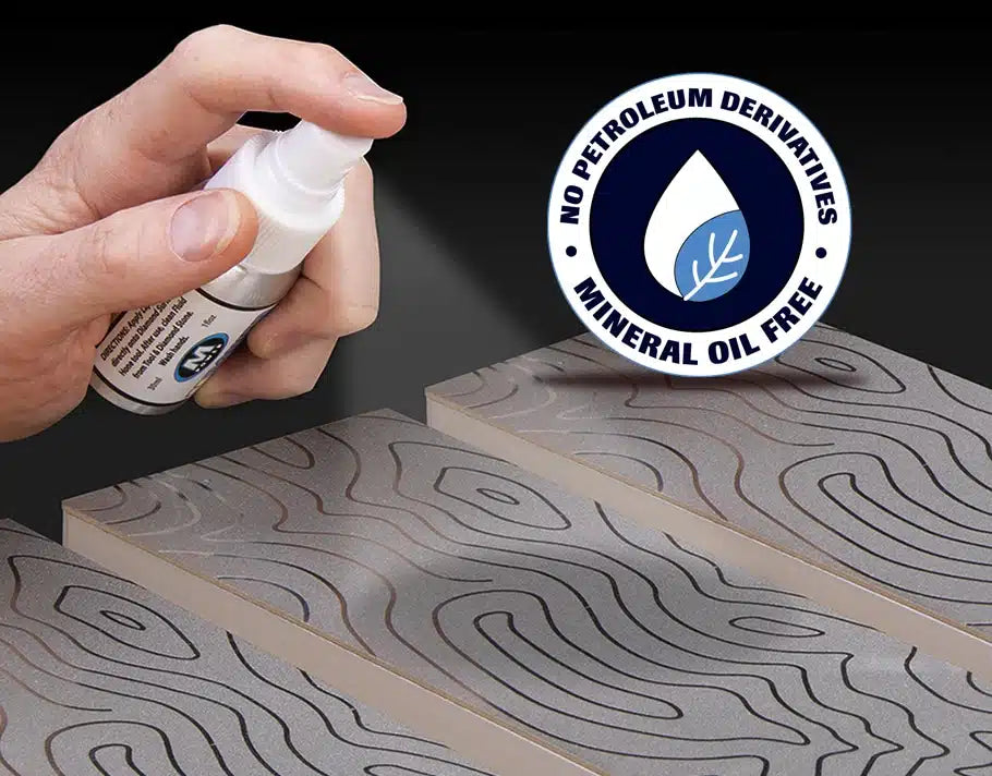 Hand spraying lapping fluid onto sharpening stones, mineral oil free, no petroleum derivatives.