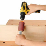 Handheld drill using sanding drum attachment on wood for woodworking project