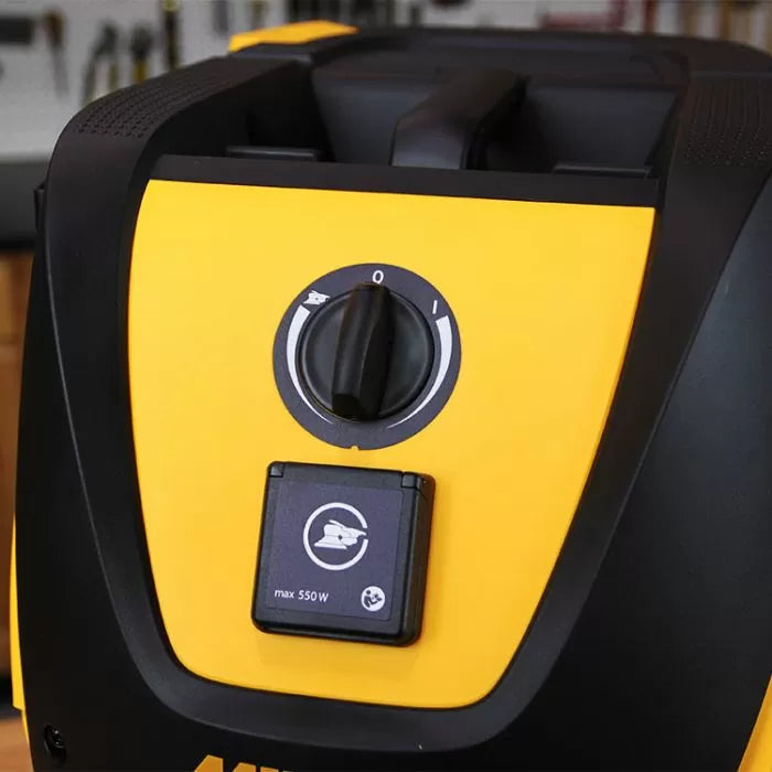 Close-up of a yellow woodworking power tool control panel with power switch and outlet