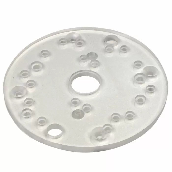 Clear round router base plate with multiple pre-drilled holes for woodworking tools