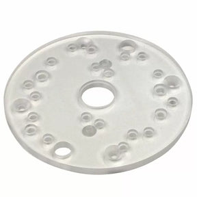 Clear round router base plate with multiple pre-drilled holes for woodworking tools