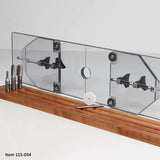 Router table fence with clear acrylic shield and woodworking router bits on wood base