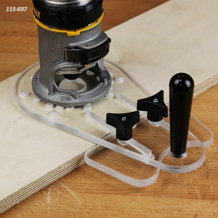 Clear acrylic router edge guide attachment on compact router with plywood on workbench