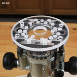 Clear acrylic router baseplate with multiple holes mounted on a woodworking router