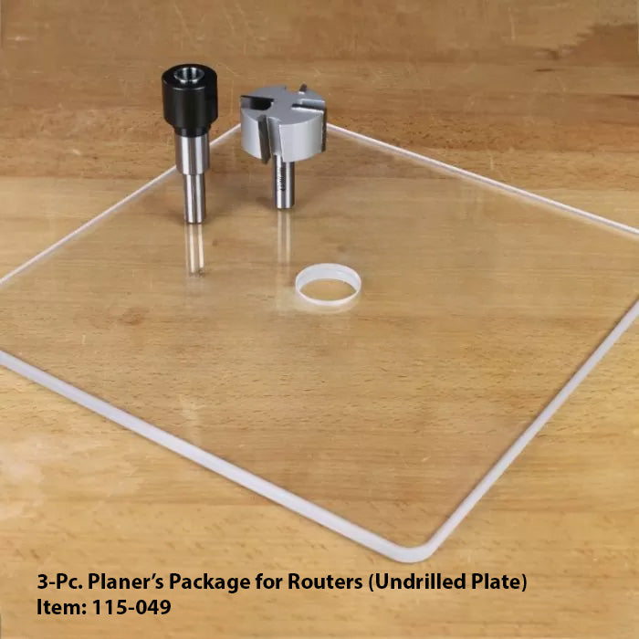 3-piece planer package for routers with undrilled clear plate and router bits on wood surface