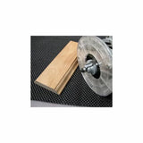 Router bit mounted in a base next to shaped wood, ideal for woodworking projects