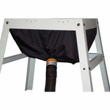 Dust collection bag with warning label attached to woodworking stand and hose