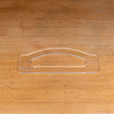 Clear acrylic handle template for woodworking on a wooden workbench