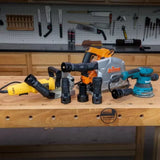 Workshop with power tools and dust collection hose adapters on a woodworking bench
