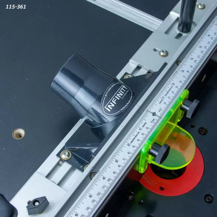 Router table fence with ruler, dust port, and safety guard for woodworking precision.