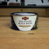 Liberon Wax Polish Black Bison Medium Oak can for woodworking on a workbench