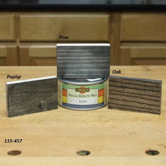 Liberon Special Effects Wax can with black finish samples on pine, oak, and poplar wood blocks