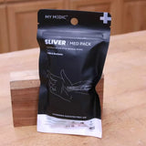 Sliver med pack first aid kit for sliver removal on wooden workbench