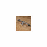 Clear safety glasses with gray frames on a wood surface, protective eyewear for woodworking