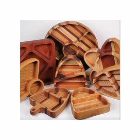 Assorted wooden trays in various shapes and patterns, ideal for woodworking projects.