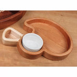 Wooden serving tray with a white ceramic ramekin on a woodworking table