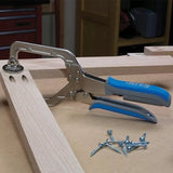 Pocket hole clamp securing wood joint with screws on a woodworking table