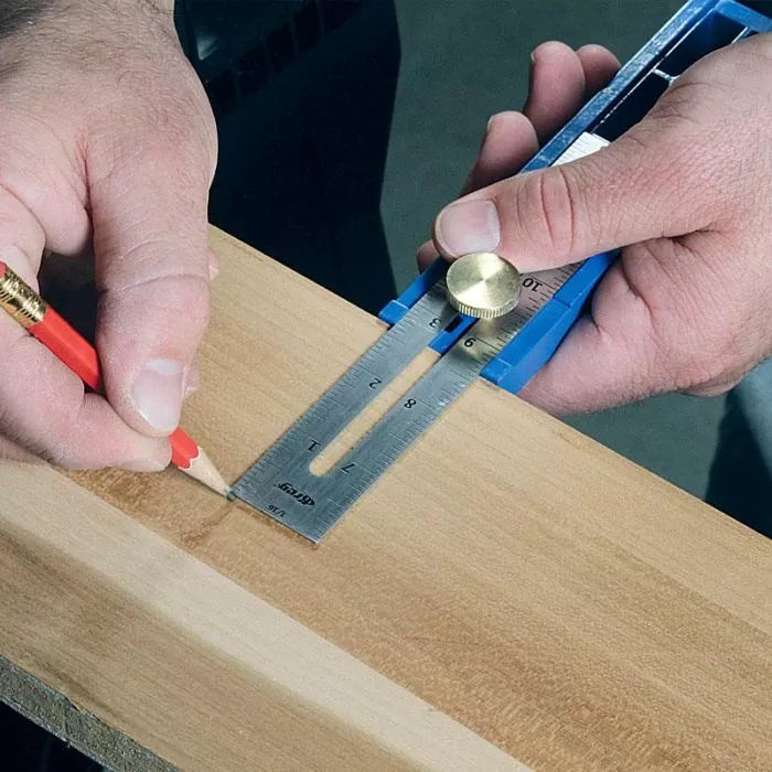 Marking precise measurement on wood with a woodworking marking gauge and pencil