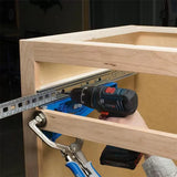 Installing cabinet drawer slides with a power drill and woodworking jig
