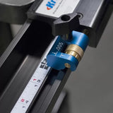 Precision woodworking fence stop with micro-adjuster on a measuring track for router table