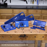 Kreg cabinet maker and installer kit with blue woodworking jigs on a workbench in a workshop