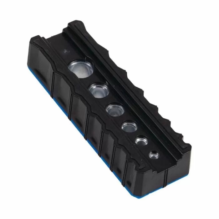 Black plastic woodworking dowel jig with multiple guide holes for precision drilling