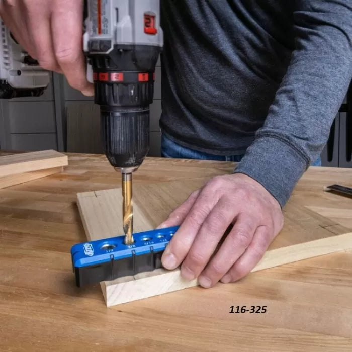 Person using drill and blue pocket hole jig on wooden board for woodworking