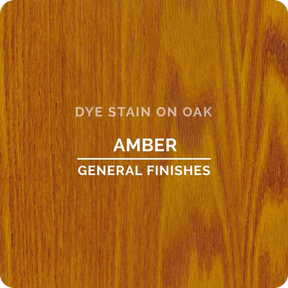 Amber dye stain sample on oak wood showing grain pattern and finish color.