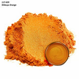 Orange mica powder pigment with a small dish showing mixed Shibuya Orange color
