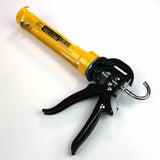 Heavy-duty caulk gun with yellow tube and black ergonomic handle on white background