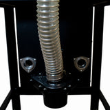 Clear flexible dust collection hose attached to woodworking router table base