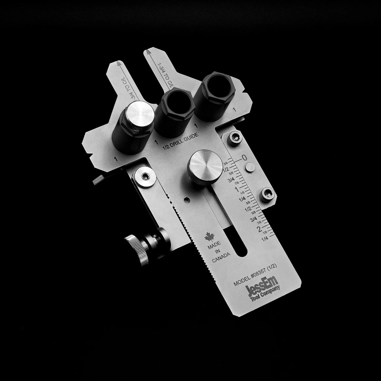 Precision woodworking drill guide jig with adjustable metal ruler and measurement markings.