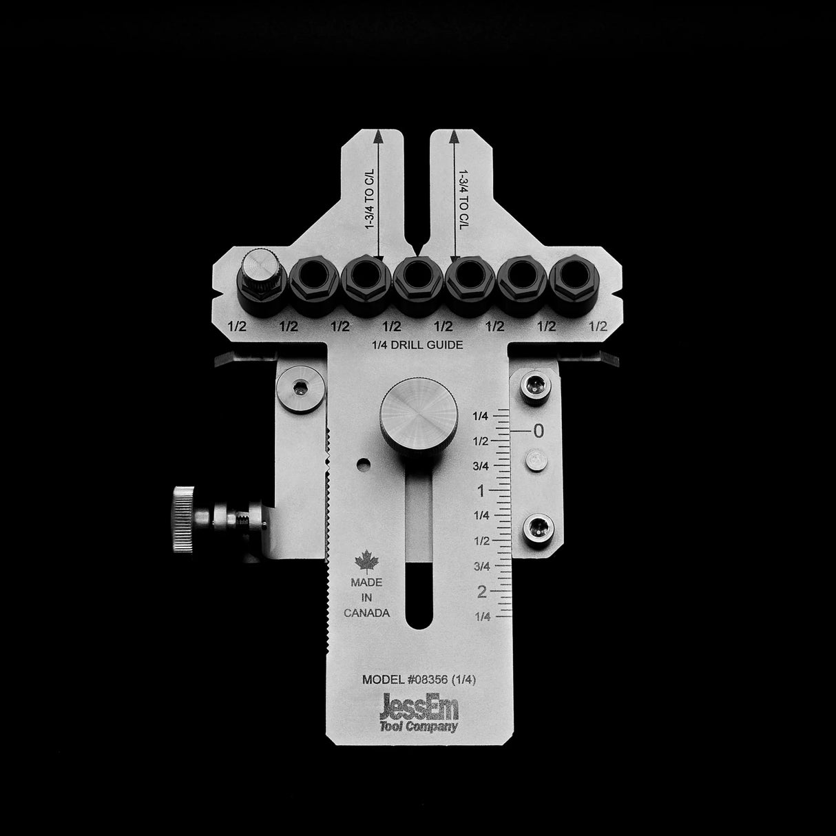 Adjustable woodworking drill guide jig with measurement markings and multiple bushings