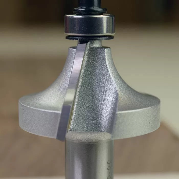 Close-up of a roundover router bit with bearing for woodworking precision cuts