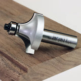 Roundover router bit with bearing on wood, ideal for woodworking edge profiles