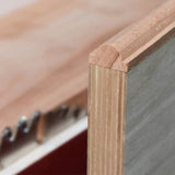 Close-up of wood edge trimming on plywood, showcasing woodworking joinery and clean routing