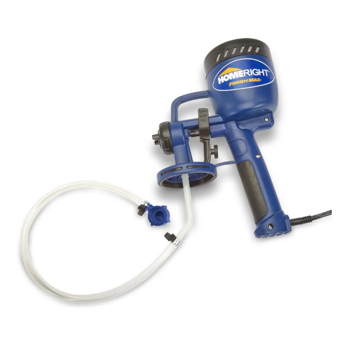 Blue handheld paint sprayer with tube attachment for woodworking and finishing projects