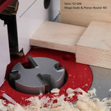Mega Dado and planer router bit cutting wood on router table, surrounded by wood shavings