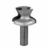 Large silver woodworking router bit with curved cutting edge, isolated on white background
