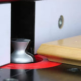 Router table setup with roundover router bit shaping wood edge for precise woodworking