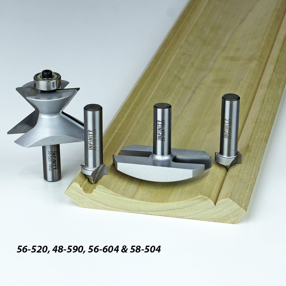 Carbide router bits displayed on routed wood molding for woodworking precision cuts